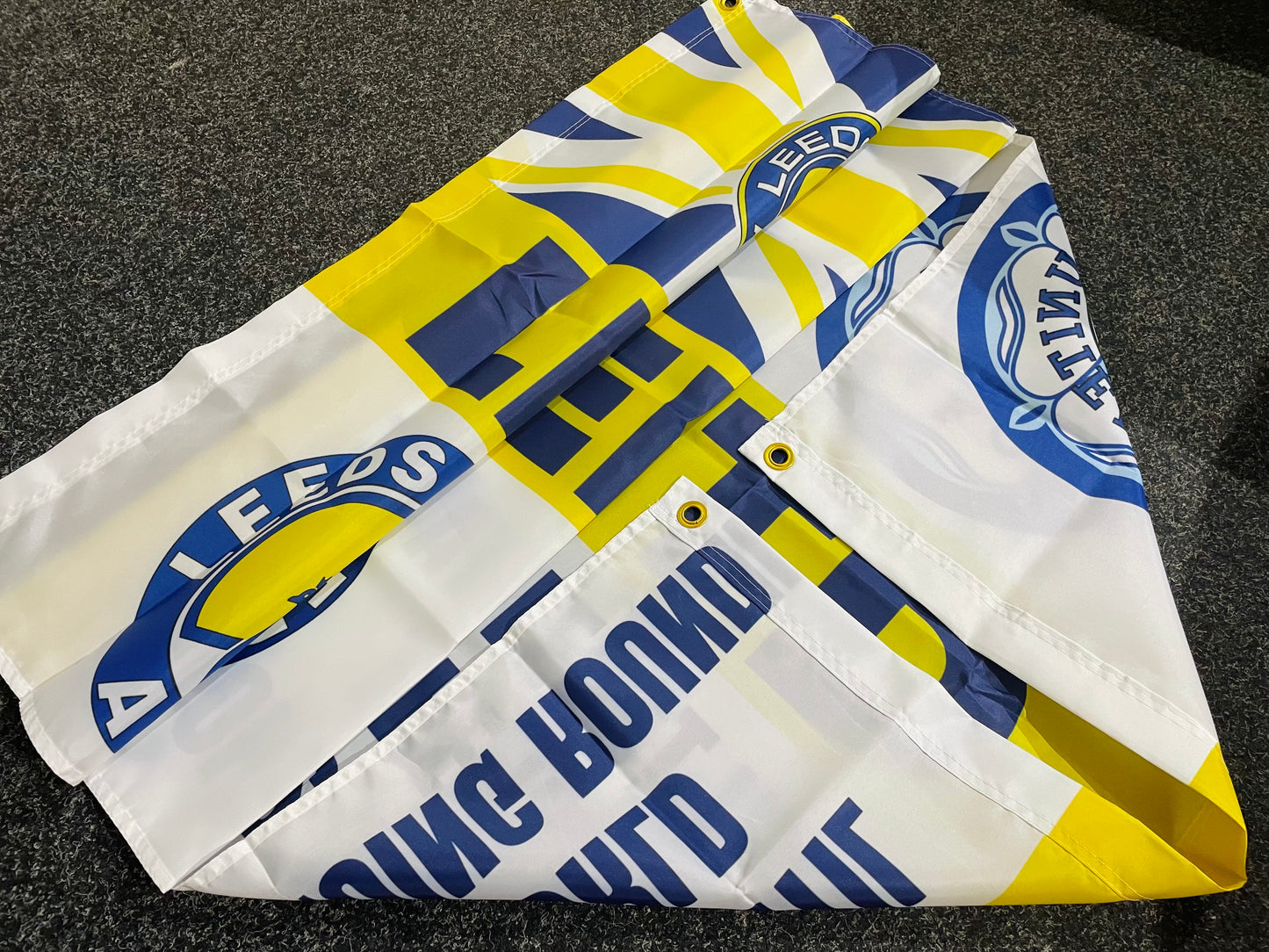 LEEDS - 'AT LEAST UNTIL' FLAG - WHITE (LU32)